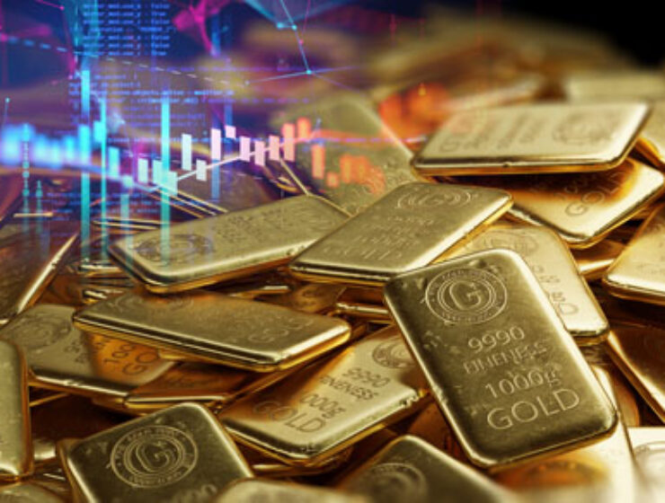 Stack,Of,Shiny,Gold,Bars,On,Financial,Gold,Price,Graph