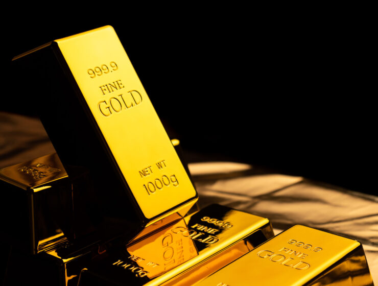 Close up of gold bars on black bacground. financial concept