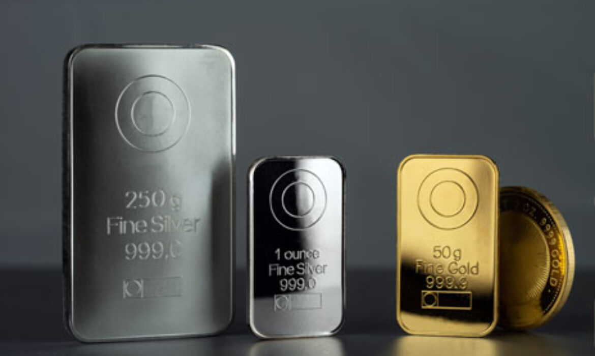 Silver,And,Gold,Bars,And,Coin,On,A,Dark,Background.